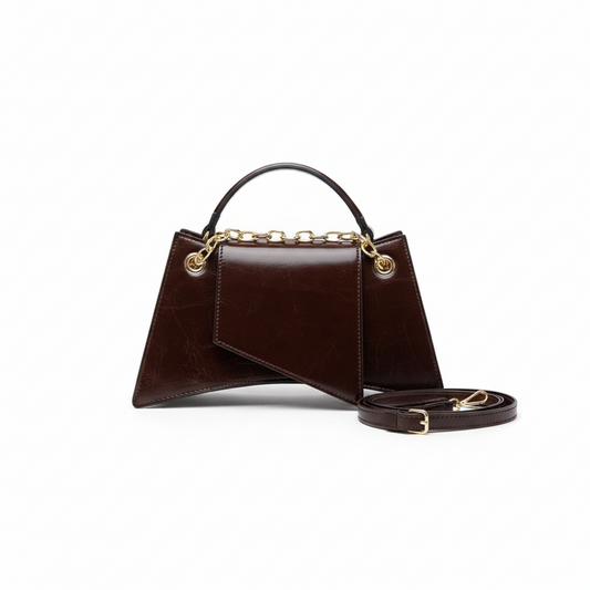 Black leather handbag with gold chain straps