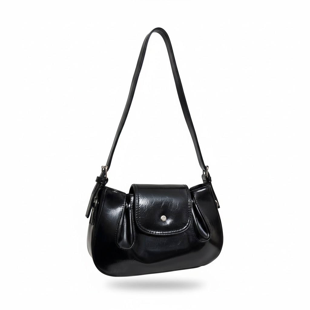 Enhanced black leather handbag on pure white background
