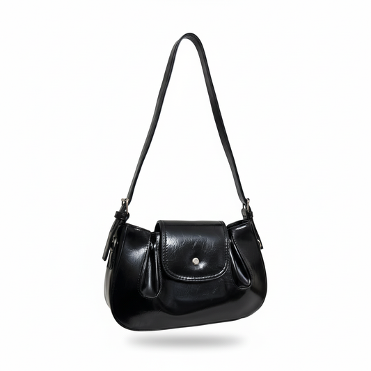 Enhanced black leather handbag on pure white background