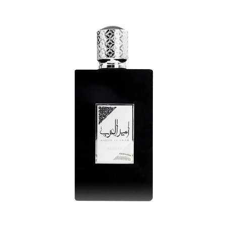 Black perfume bottle with silver cap on a white background