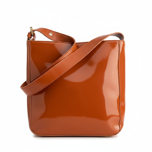 Orange cognac patent leather shoulder bag - saturated